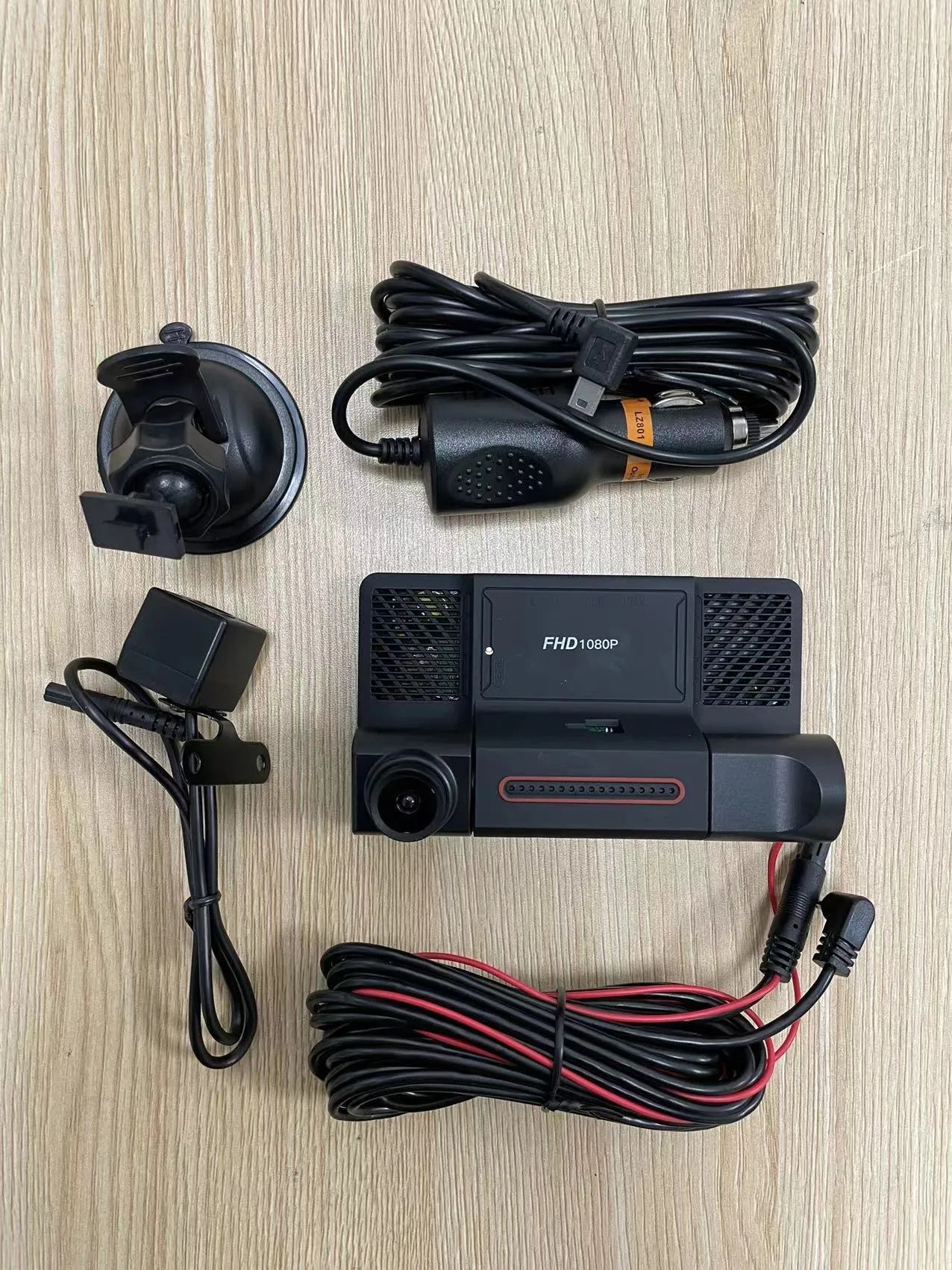 Black three-lens dashcam with 4-inch touch screen for front and rear car recording