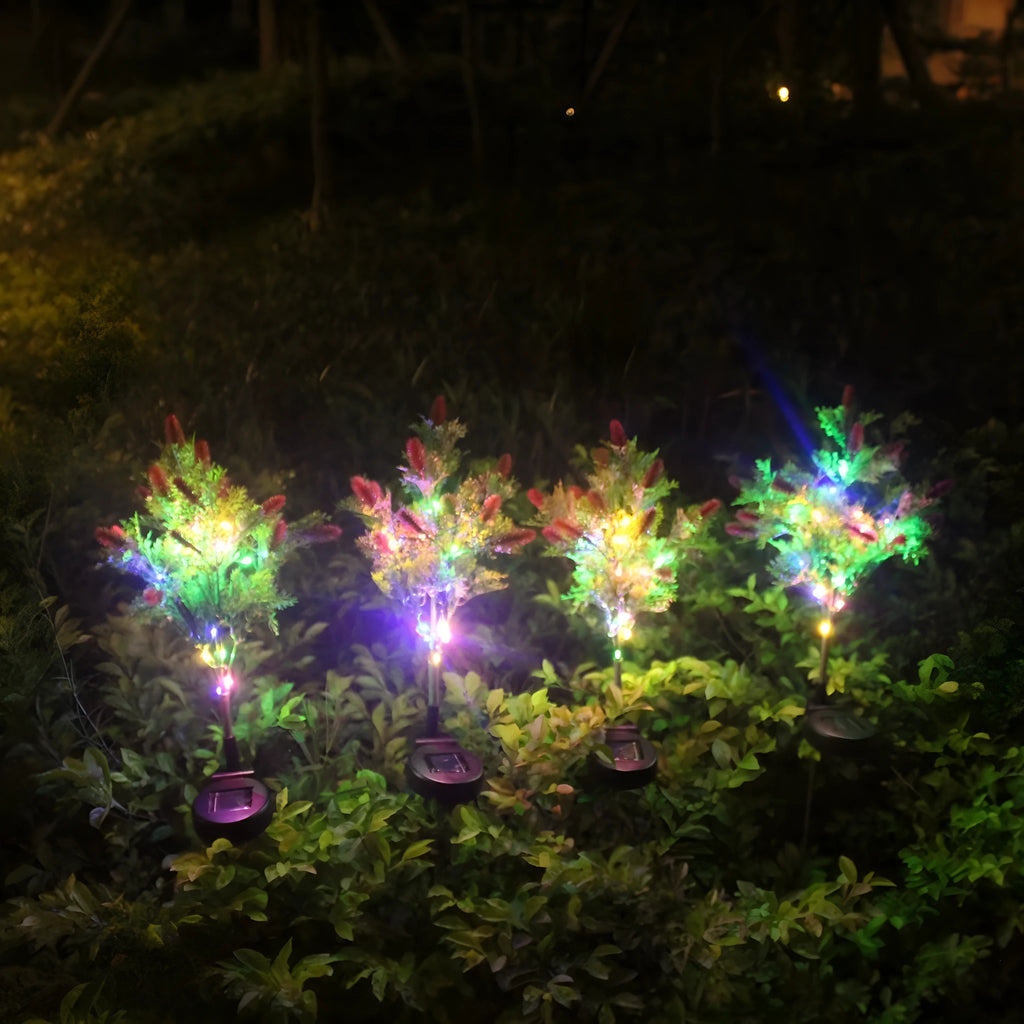 LED solar Christmas tree ground lamp with 15-color LED, 70cm tall, plastic and stainless steel construction, purple or red options