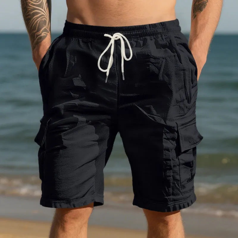 Men's linen blend casual shorts with multiple pockets in light blue colour showing loose-fit design