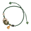 Hand-woven flexible wire watch band with Pearl Peace Buckle and round jade pearl decoration