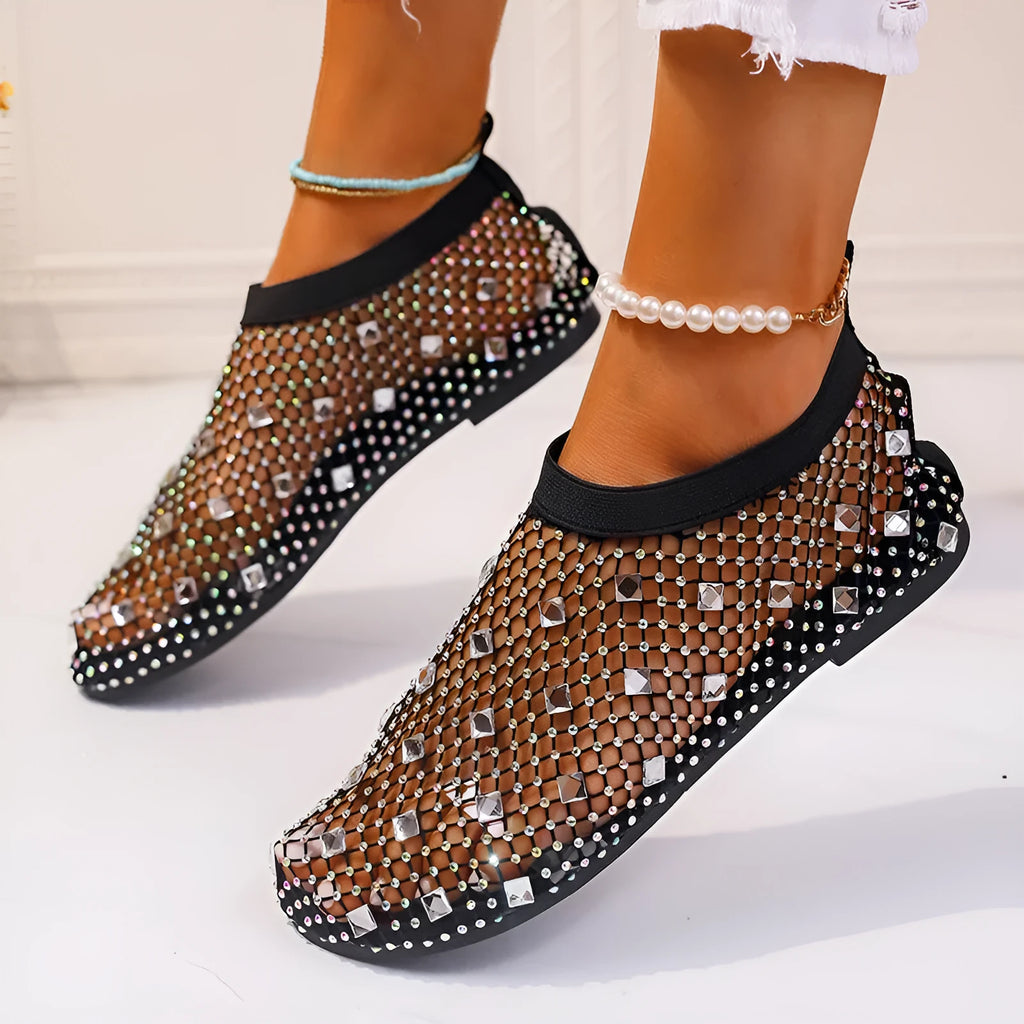 Women's colourful rhinestone mesh flat sandals on white background showing round toe design