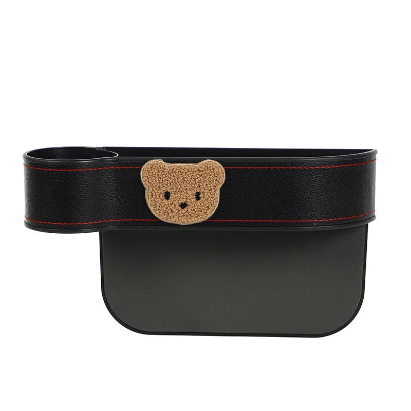 Car seat gap storage box with cartoon bear design made from leather