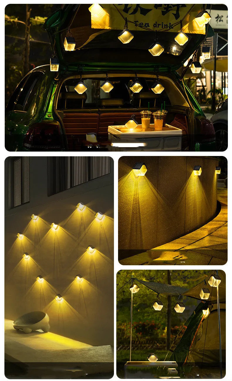 Outdoor solar ice brick chandelier with dual colour LED warm and colour light hanging in a garden