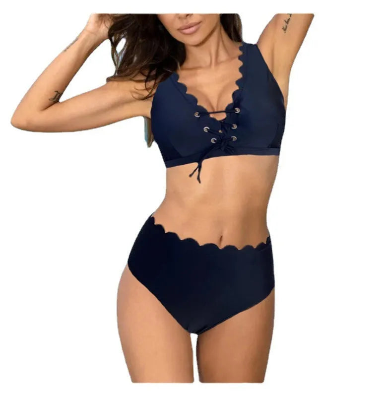 Women's solid colour polyester split swimsuit with gathering detail on a brief