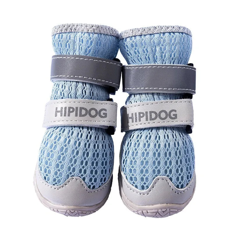 Cartoon-style blue and green dog shoes made from PU material for summer paw protection.