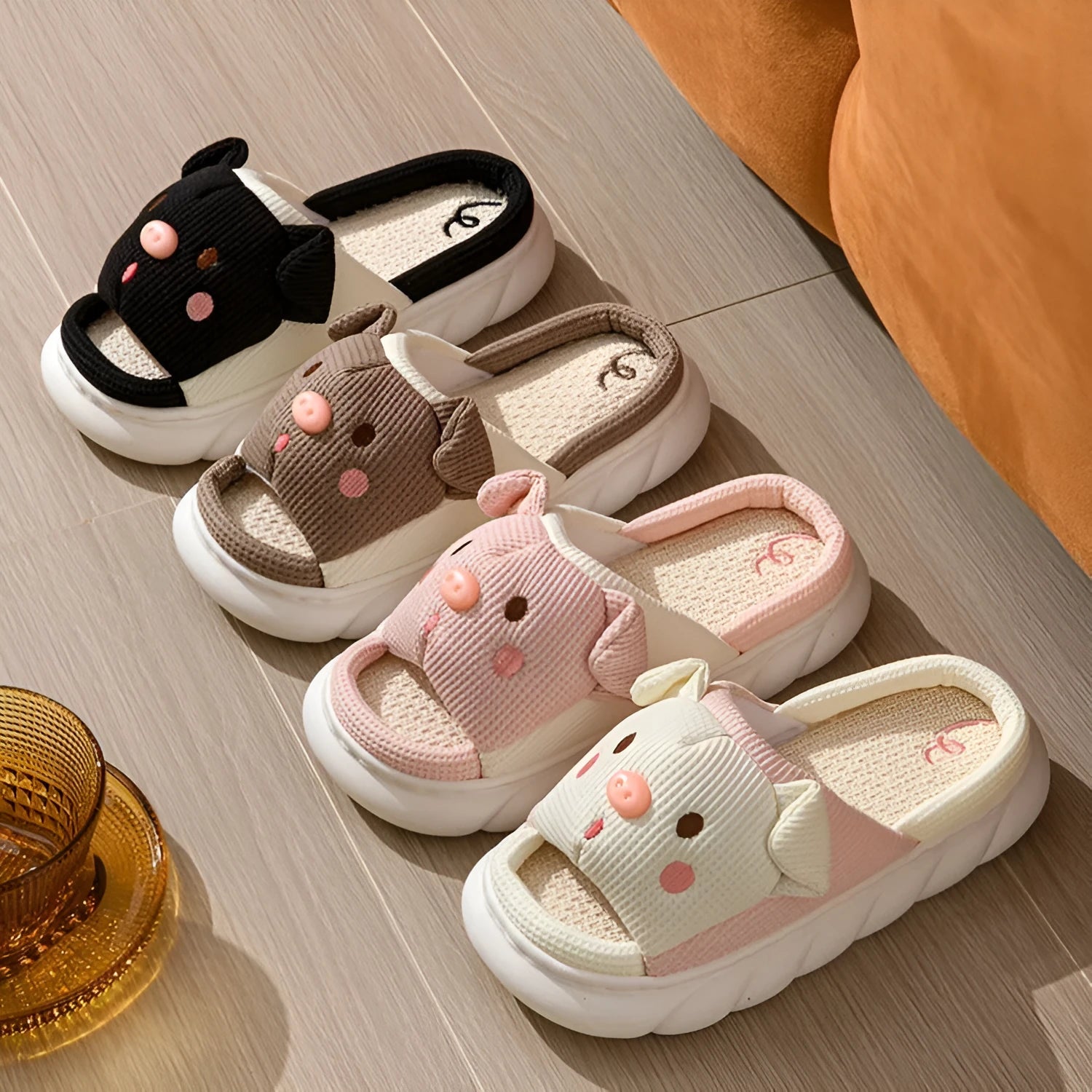 Piggy Cute Couple open-toe linen slippers in various colours, showing sewn PVC sole.
