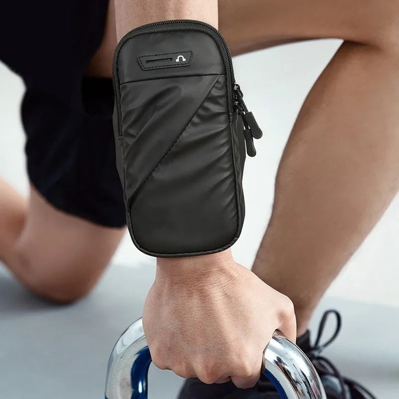 Outdoor cycling men's arm sleeve phone pouch in black colour for 7.2 inch phone on fabric background