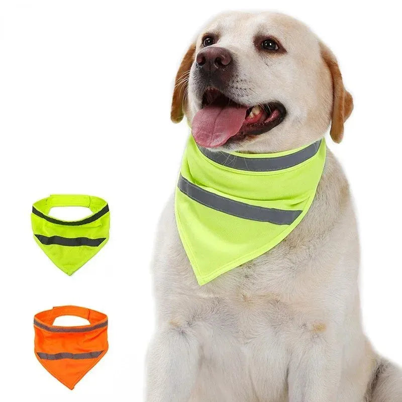 Yellow and orange reflective dog bandana scarf with adhesive fastening strap laid flat.