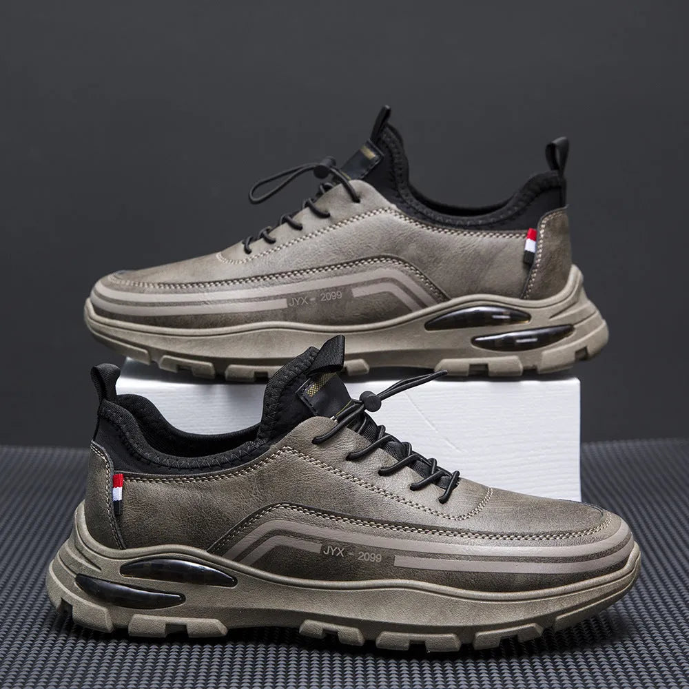 Men's black fleece-lined waterproof sneakers with a round toe and low-top design on a rubber sole.