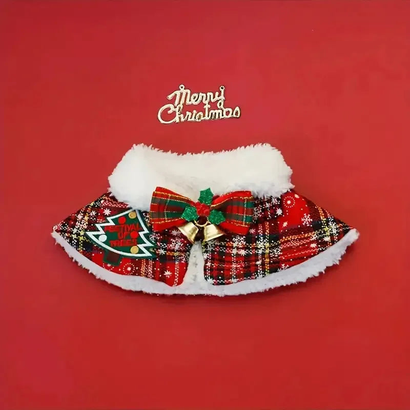 Red festive pet scarf with bell print draped on a dog's neck for winter and Christmas.