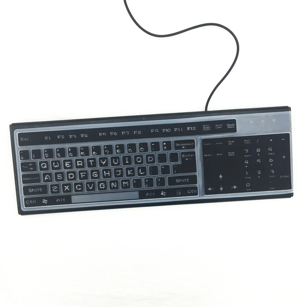 Transparent silicone keyboard dust film for laptop, showing close fit over keys