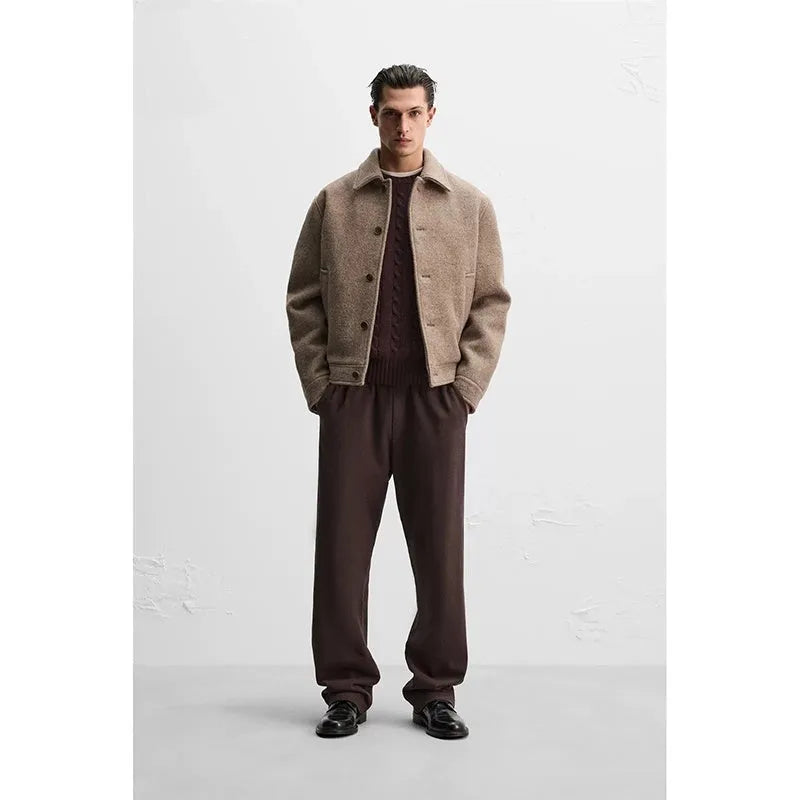 Men's taupe loose wool woven lapel long sleeve single-breasted casual jacket coat on a model