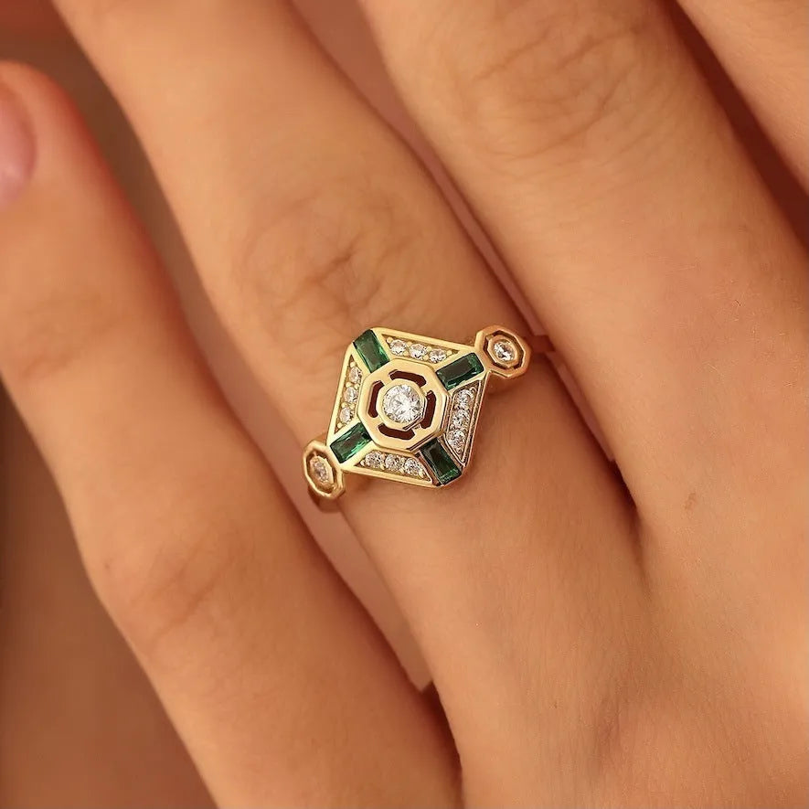 Square ins style women's ring with a lvzuan gemstone on a geometric electroplated band.