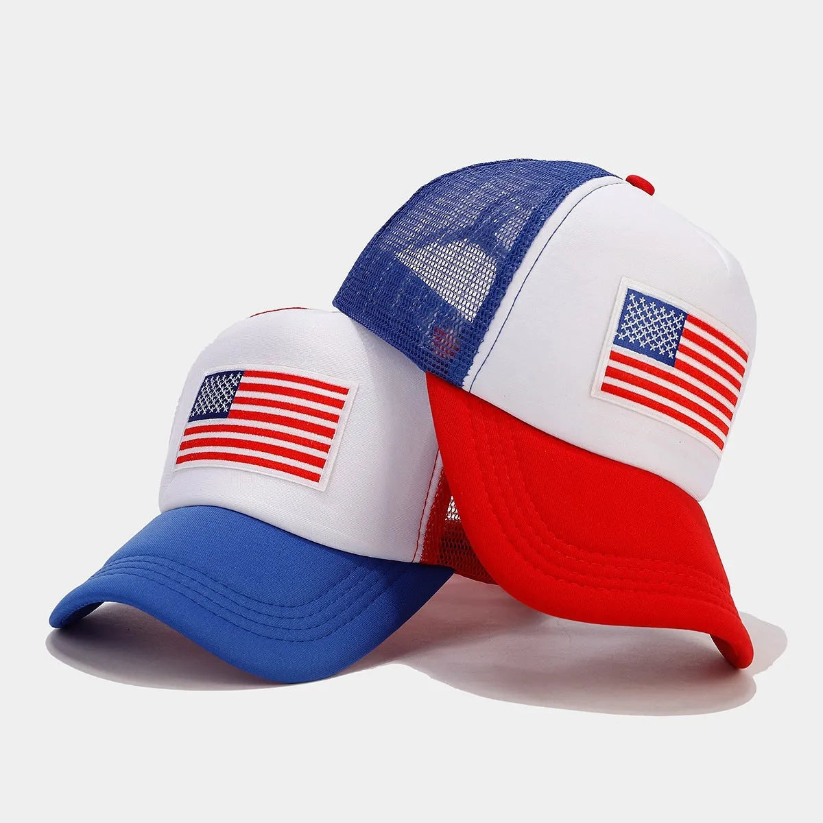 Red and blue contrasting breathable mesh baseball cap with adjustable strap on a dome crown.
