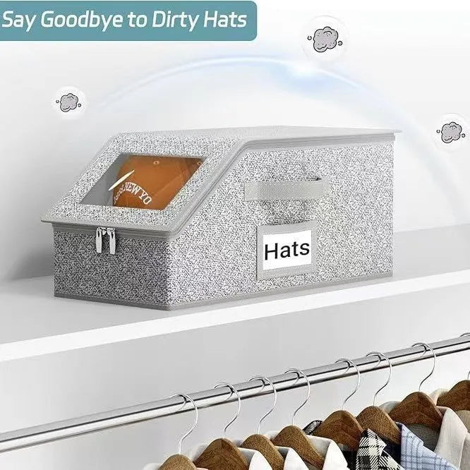 Grey foldable fabric storage box with cover, shown next to a baseball cap.