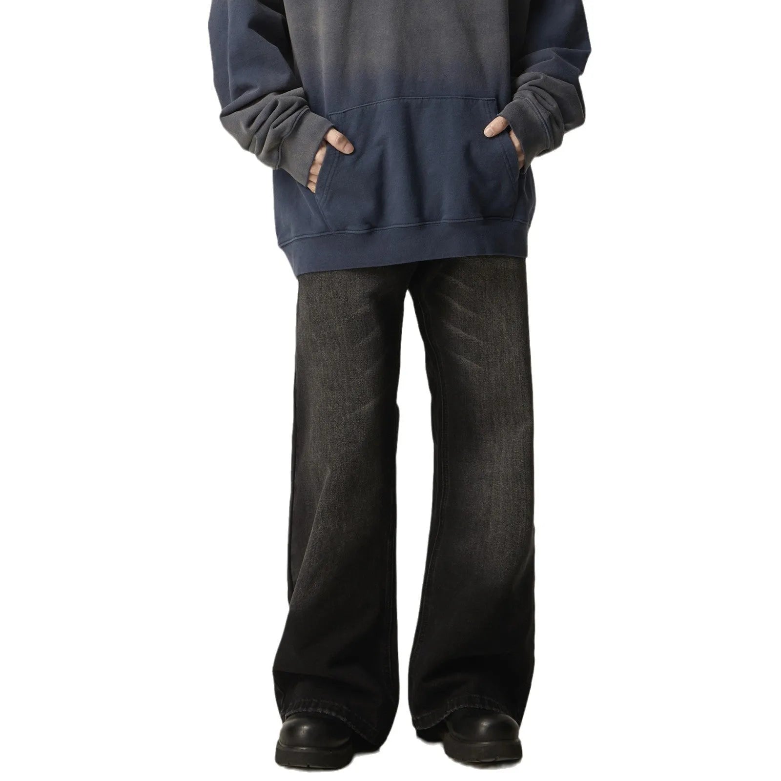 Black loose-fit straight-leg retro jeans with zipper fly on a plain background.