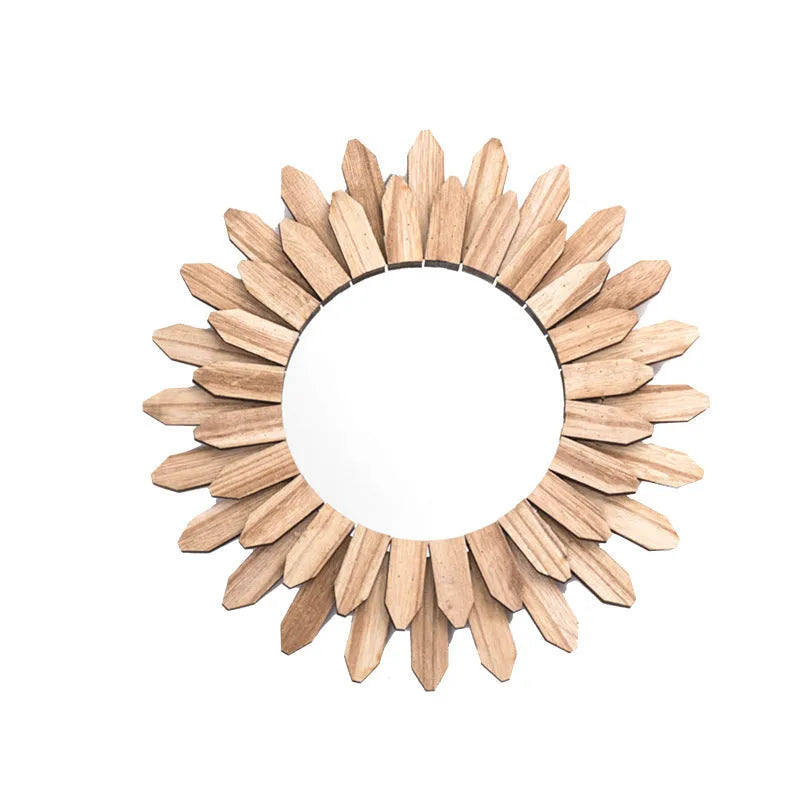 European style solid wood round hanging mirror in baked colour finish on a wall.
