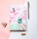 Muco Sakura Flower Orbit AR design hardcover notebook in pink, green, red, or yellow.