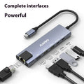 Aluminium Steam Deck docking station with six ports including HDMI, Ethernet, and USB, shown with a 15cm cable