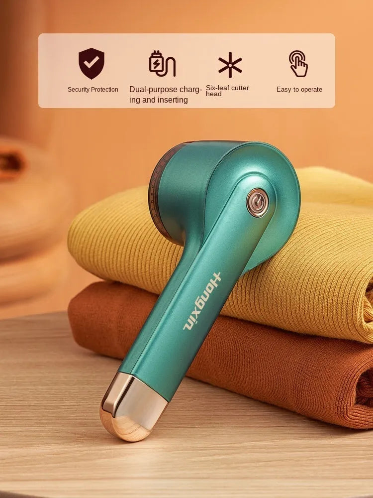 USB hair ball trimmer in choice of colours with stainless steel blade net for pet grooming and fabric care.
