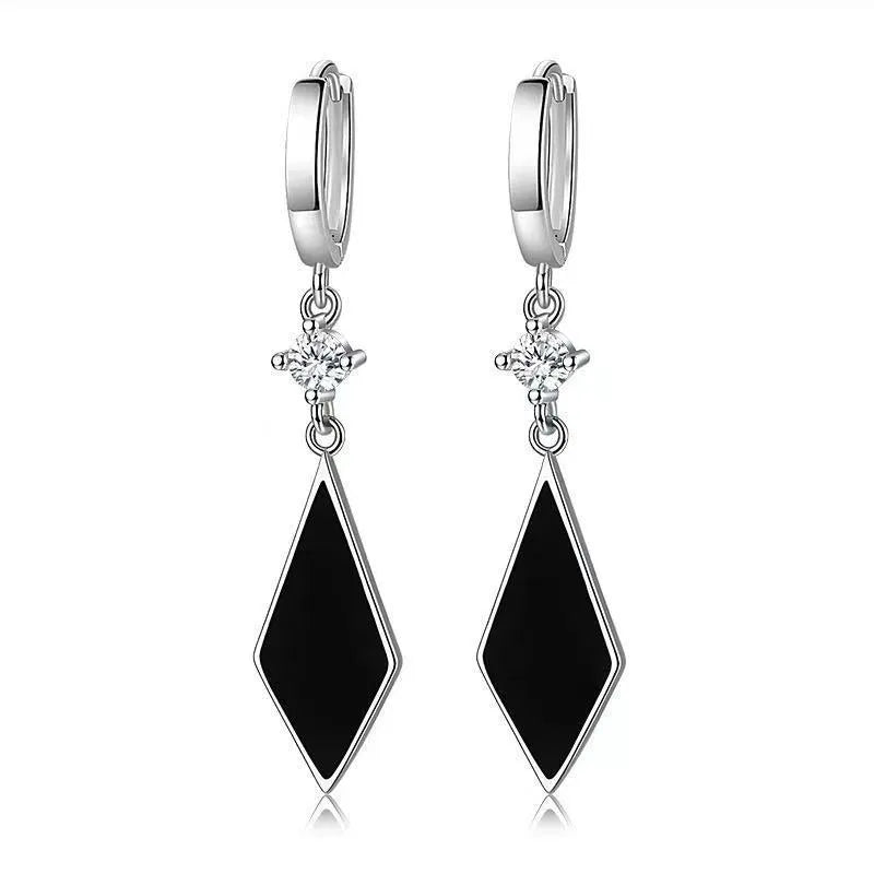 Silver geometric diamond-shaped clip earrings with vintage finish