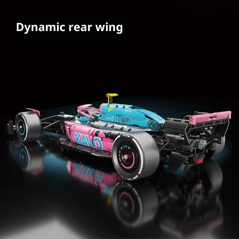 Mechanical F1 racing building blocks car in blue and pink with small plastic particles assembled on a surface