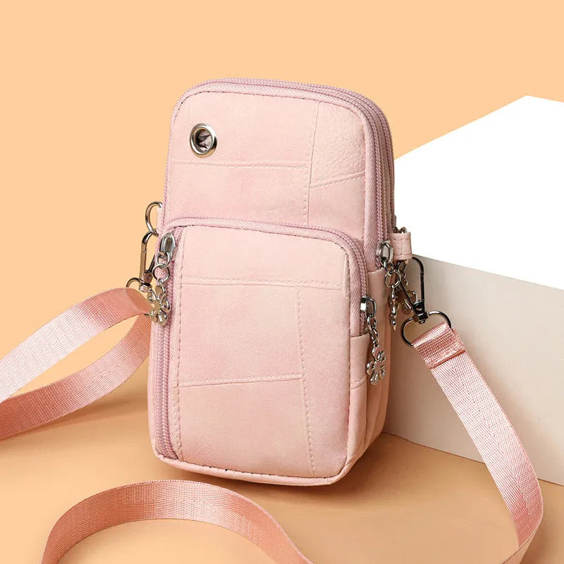 Vertical square mini phone bag in PU material with sandwich pocket, shown in available colours