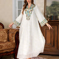 White Arabic women's robe with long sleeves and full-length skirt