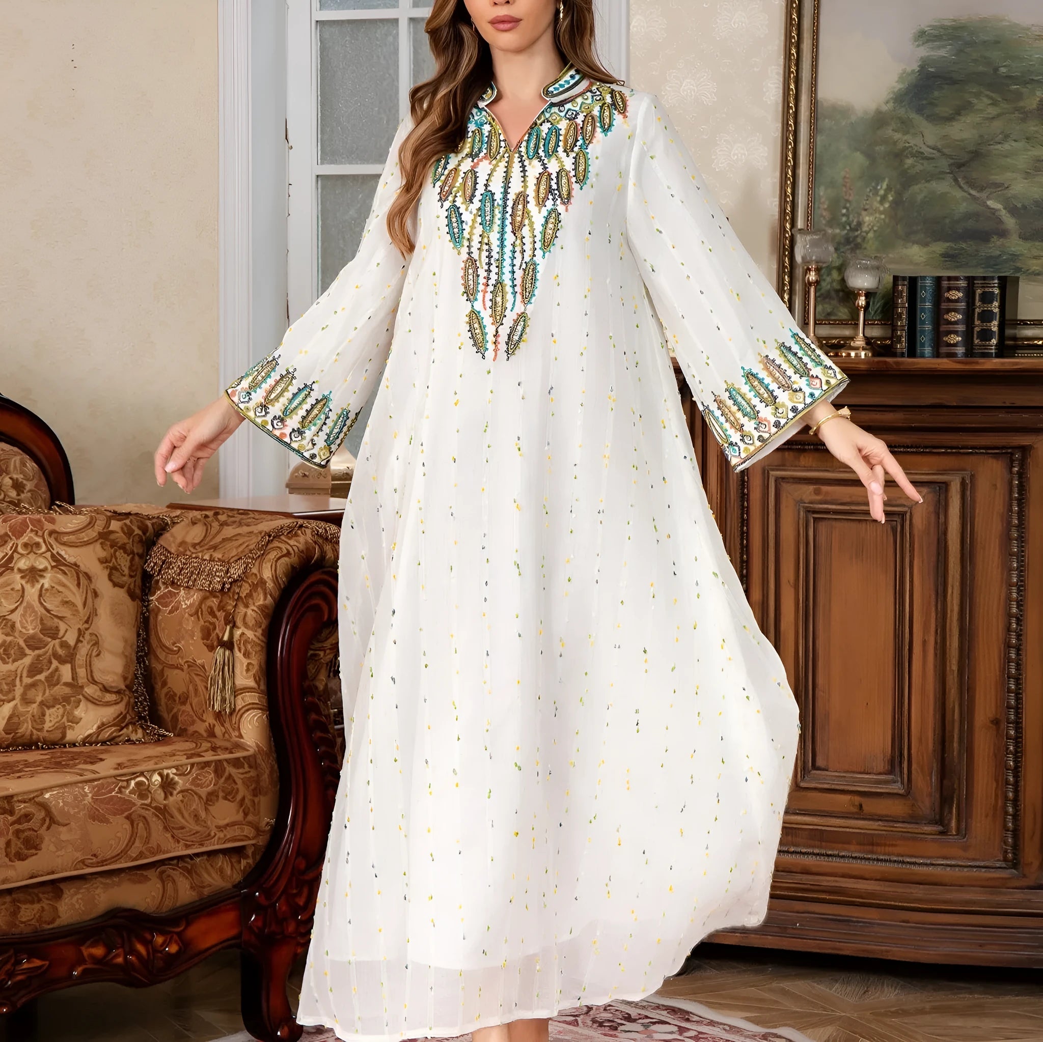 White Arabic women's robe with long sleeves and full-length skirt