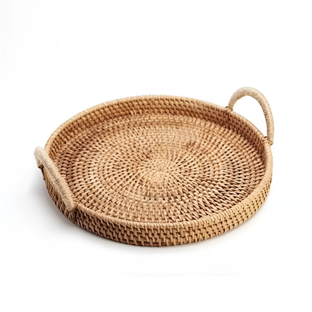 Round handwoven rattan storage basket with a wooden handle in a natural colour.