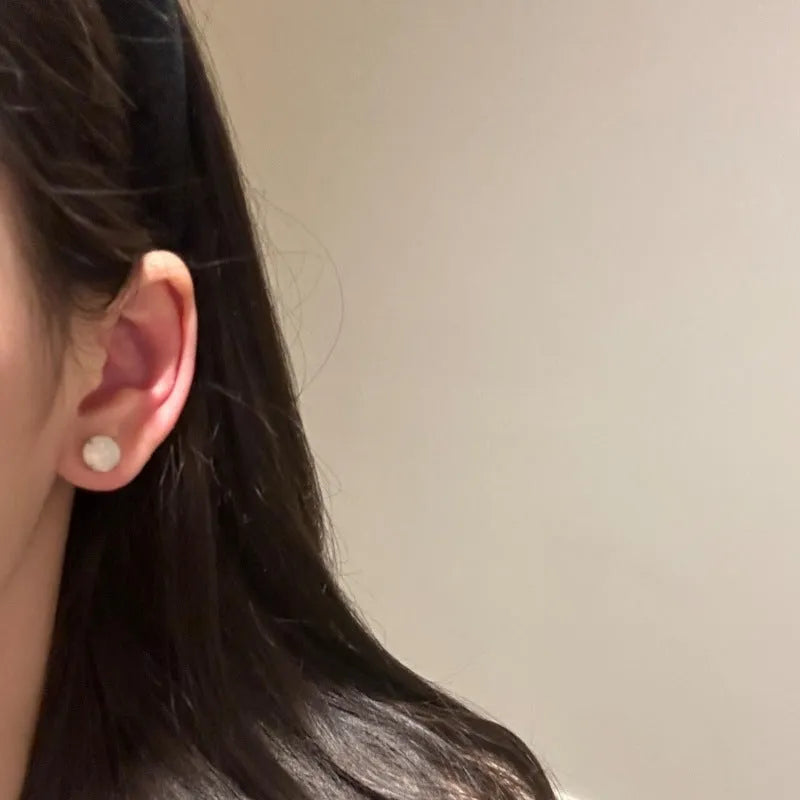 Chinese style geometric chalcedony stud earrings in four claw setting with round egg surface stones