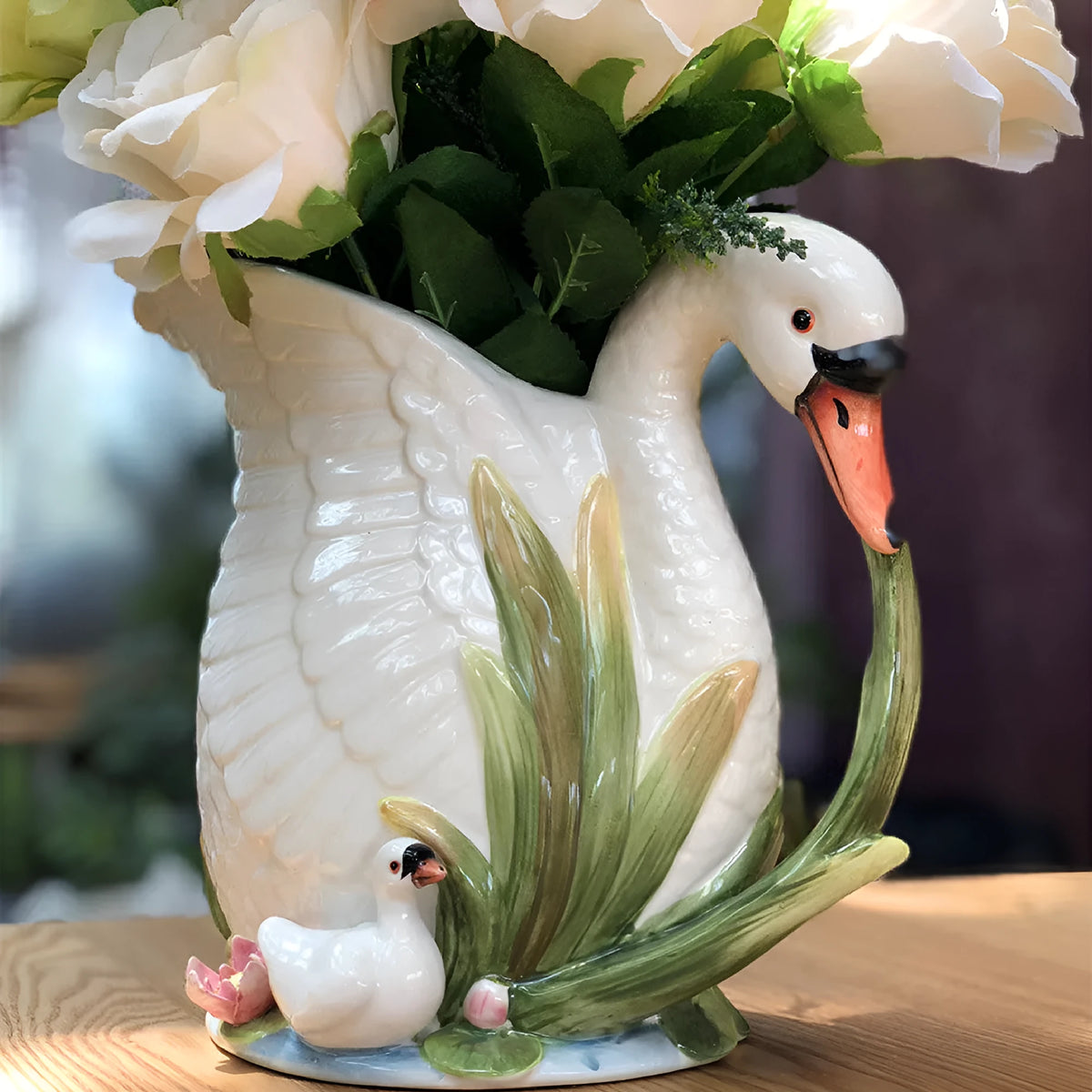 Ceramic vase with embossed swan pattern, pastoral style, 24.1cm length, picture colour, on a shelf