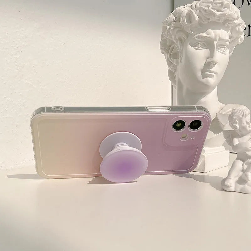 Yellow to purple gradient silicone protective case for iPhone on a table
