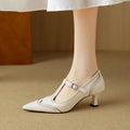Women's black and white stiletto heels with skull engraving pattern, French vintage style, on a high heel over 8cm.