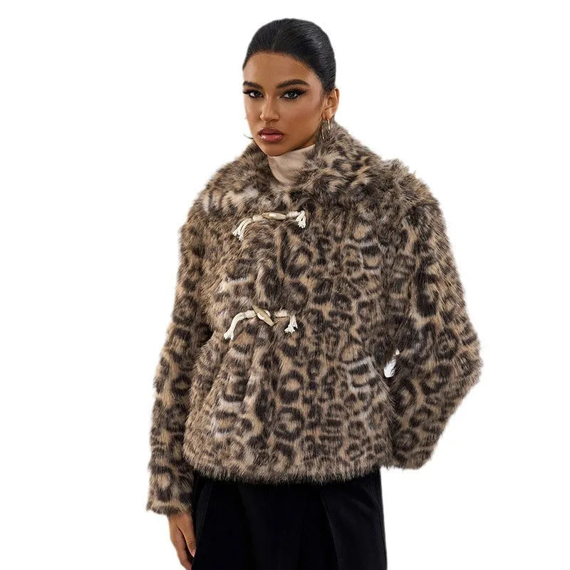 Women's leopard print coat with a buckle lapel on the collar.