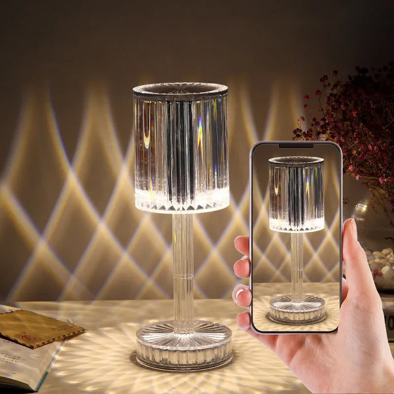 Modern crystal table lamp with touch dimming base and transparent K9 crystal bead lampshade on a nightstand.
