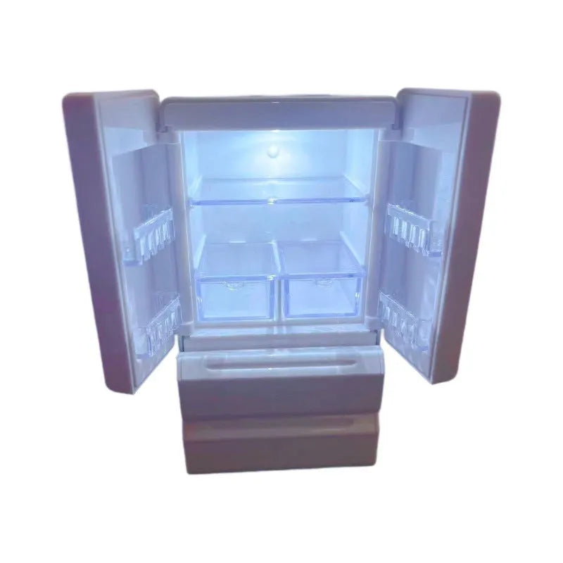 White plastic miniature candy shop model with LED light on, showing detailed front.
