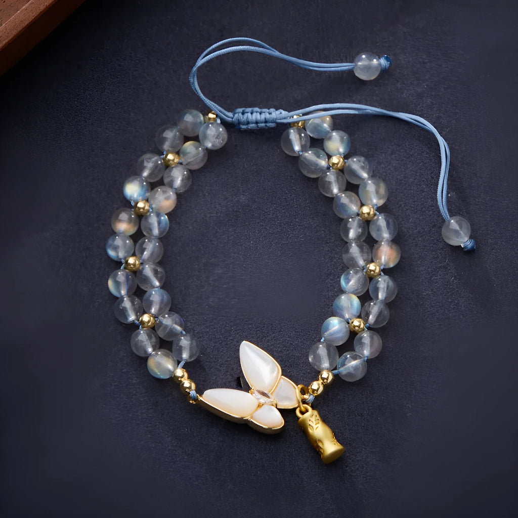 Grey moonstone woven bracelet for women with geometric design and butterfly detailing