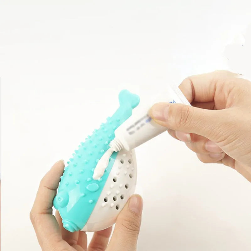 Mint Toys blue silicone fish-shaped cat chew toy with integrated toothbrush on a white background.