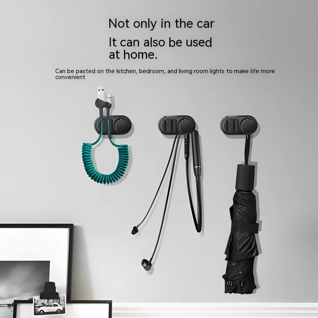 ABS silicone adhesive hook for car data cable storage in dark green, silver, or black.
