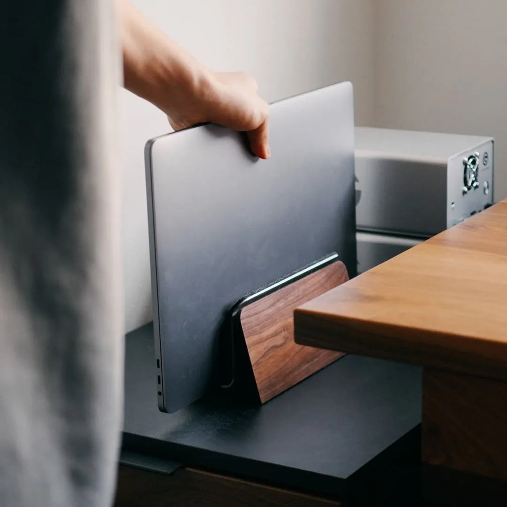 Walnut solid wood laptop stand on desk with universal fit and compact size