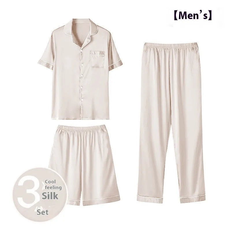 Men's black ice silk three-piece loungewear set with shorts and trousers on a hanger.