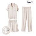 Men's black ice silk three-piece loungewear set with shorts and trousers on a hanger.