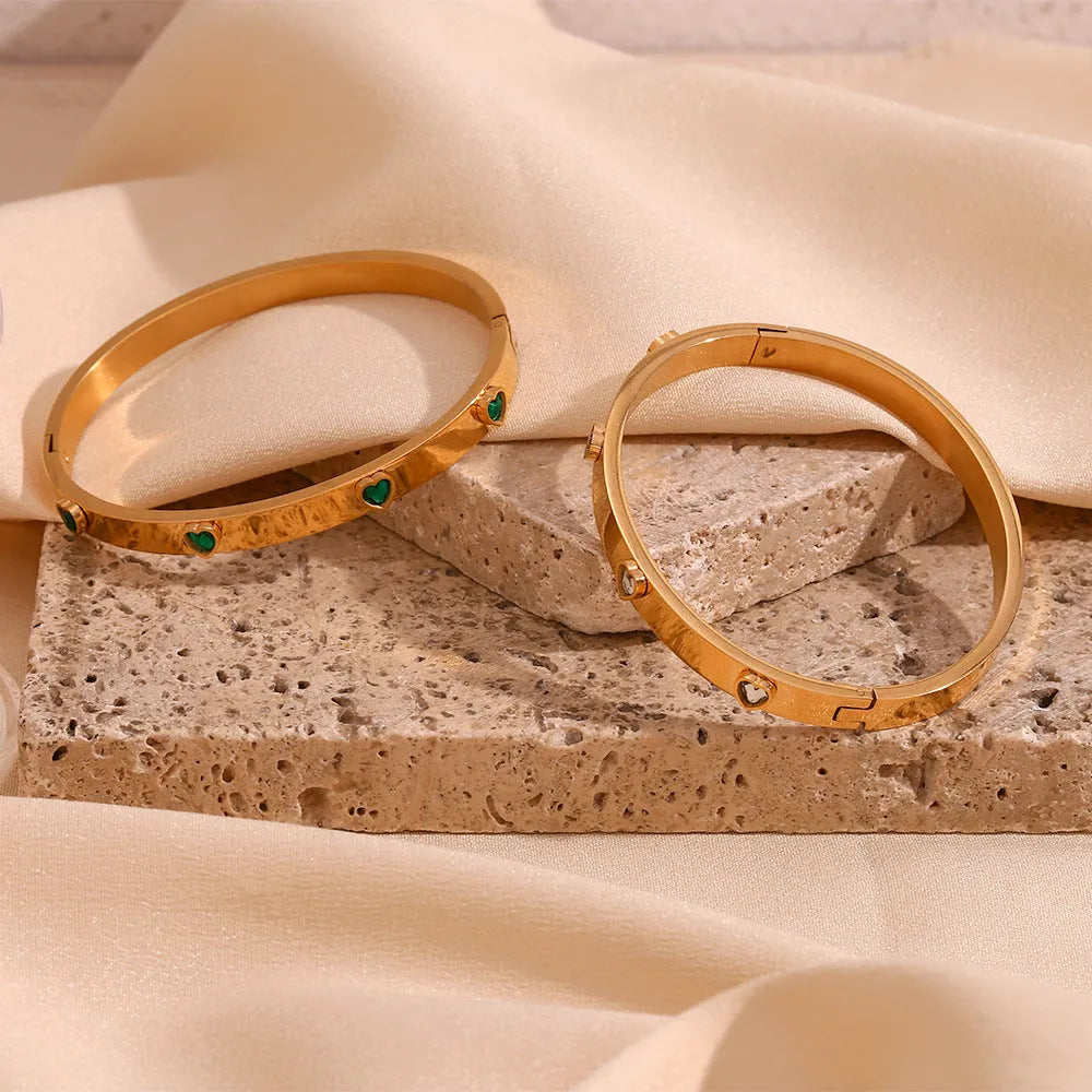 Stainless steel bracelet with micro-inlaid peach heart design in golden-lvzuan or white diamond finish