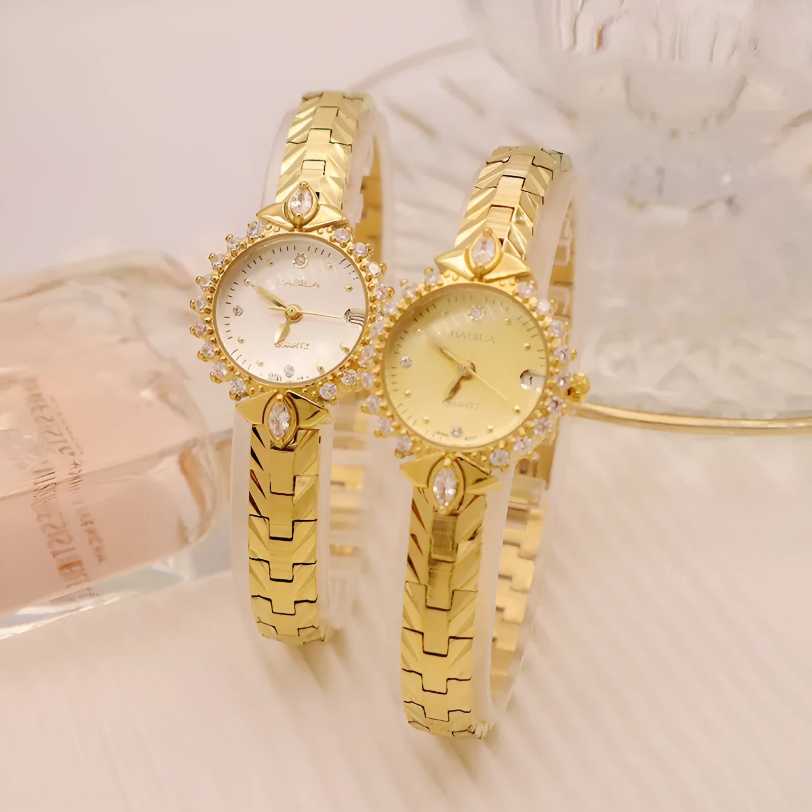 Vintage quartz bracelet watch with diamond-embossed detailing and golden face