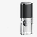 Portable white electric coffee grinder with USB charging cable and ground coffee