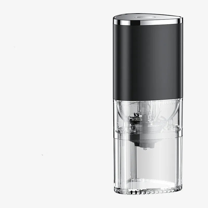 Portable white electric coffee grinder with USB charging cable and ground coffee