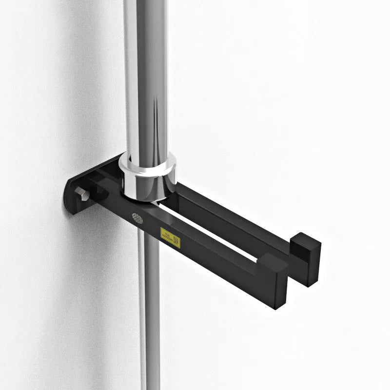 Wall-mounted black steel barbell rack holding multiple Olympic bars against a wall