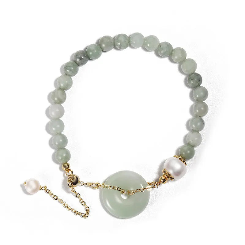 Women's Korean style crystal bracelet showing options with jade pendant or coloured stone safety buckle.