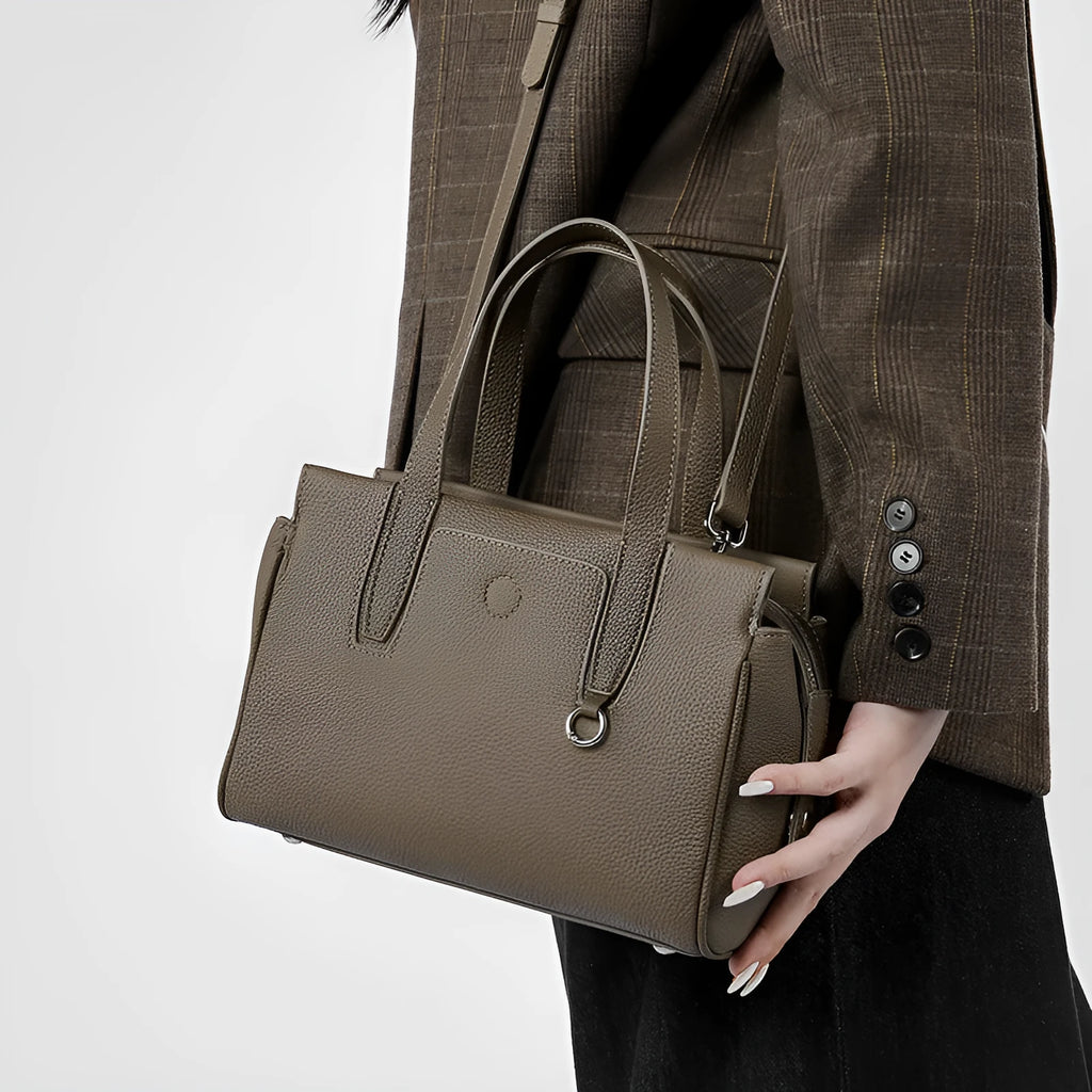 Genuine cowhide leather crossbody bag in horizontal square design with adjustable shoulder strap